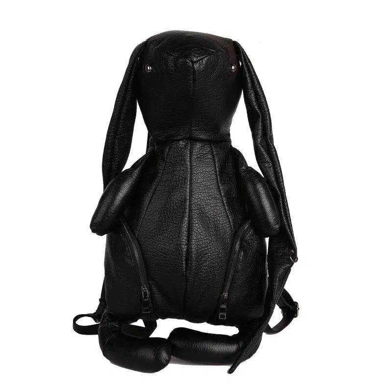 Black PU women's bucket backpack with double straps, patchwork stitching and internal phone, ID and hidden pockets