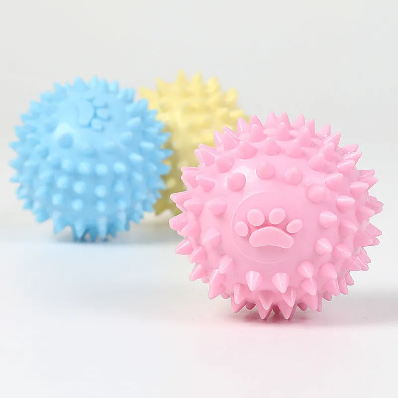 6cm blue TPR rubber dog chewing ball with textured footprint design for tooth cleaning