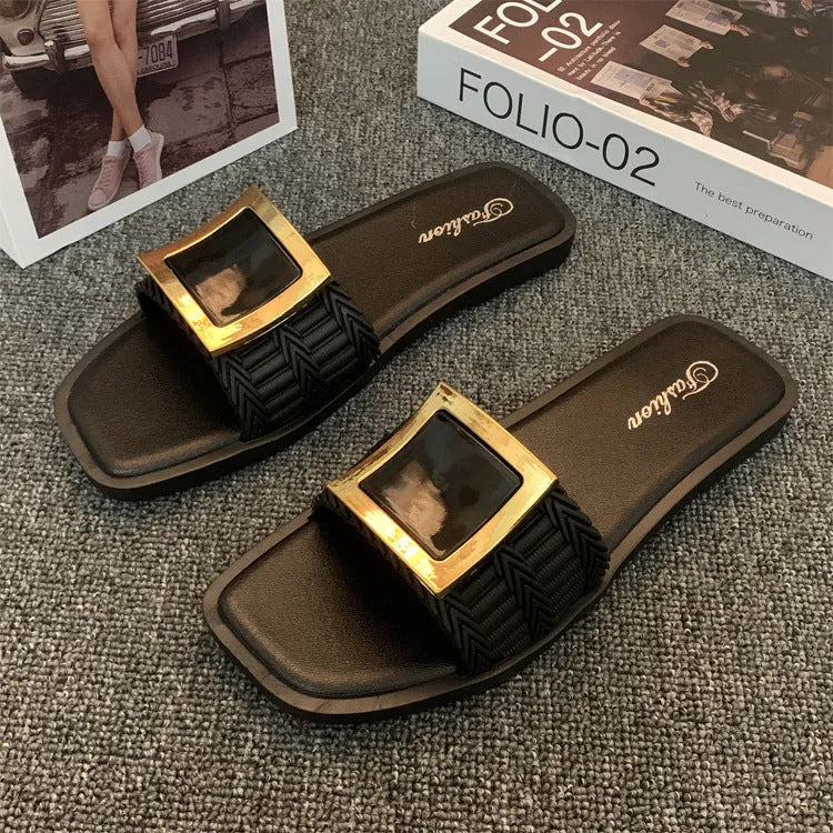 Women's apricot coloured flat summer slippers with a textured PVC sole.
