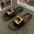 Women's apricot coloured flat summer slippers with a textured PVC sole.