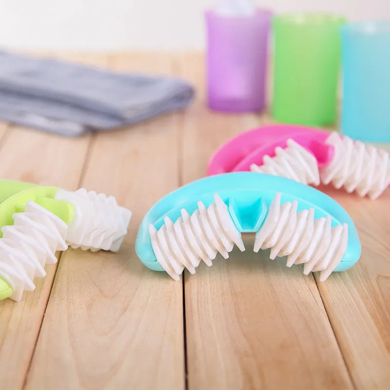 Handheld anti-cellulite massager roller in blue dot wheel finish with compact 13.5x8.5cm body