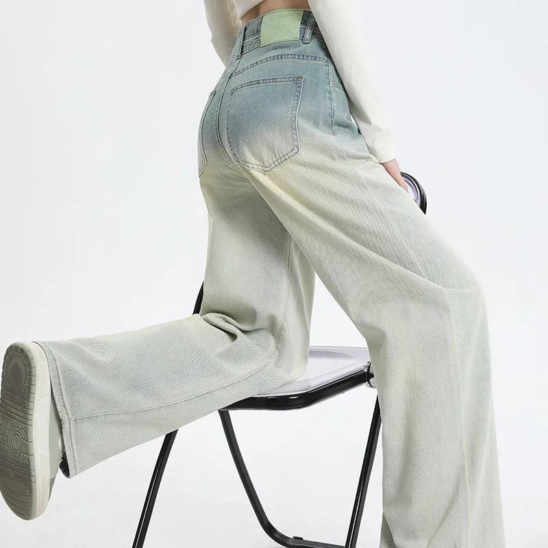 Women's wide-leg straight-cut denim trousers in a gradient blue colour wash.