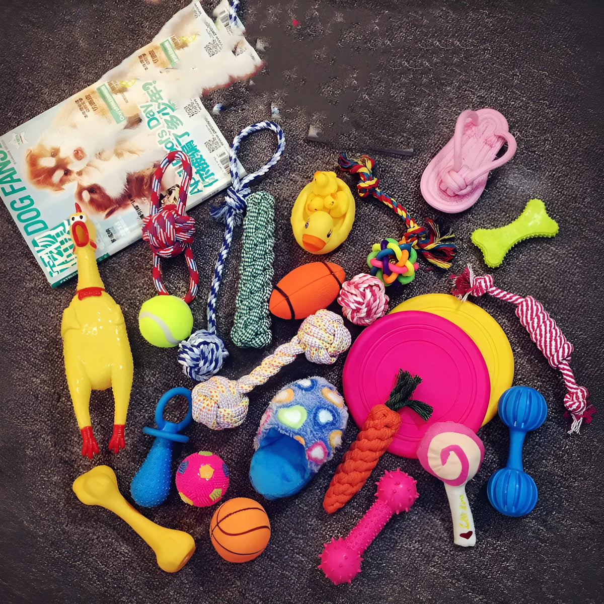 Assorted cotton rope and rubber dog toys for molar chewing, teething, and training play.