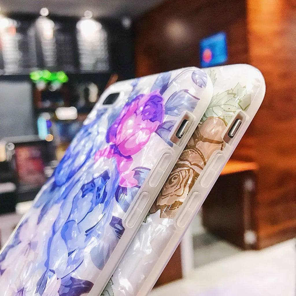 Dream Shell soft TPU iPhone case with rose flower pattern in brown, purple, or white.