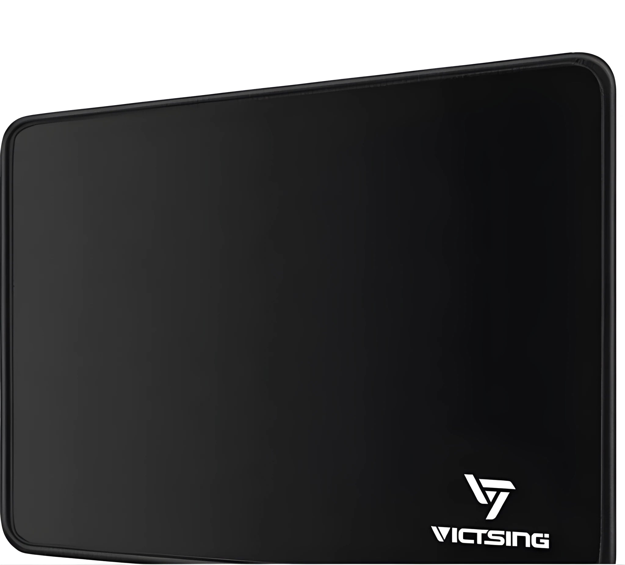 Black rough grain rubber desk mat for keyboard and mouse, shown on a desk
