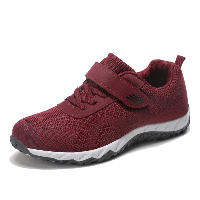 Women's grey purple low-top wedge heel shoes with Velcro strap and round toe.
