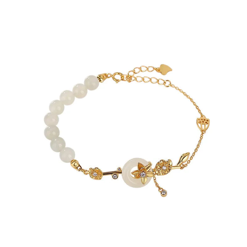 Women's antique bracelet with Hetian jade inlay and lotus peace buckle design in 925 silver