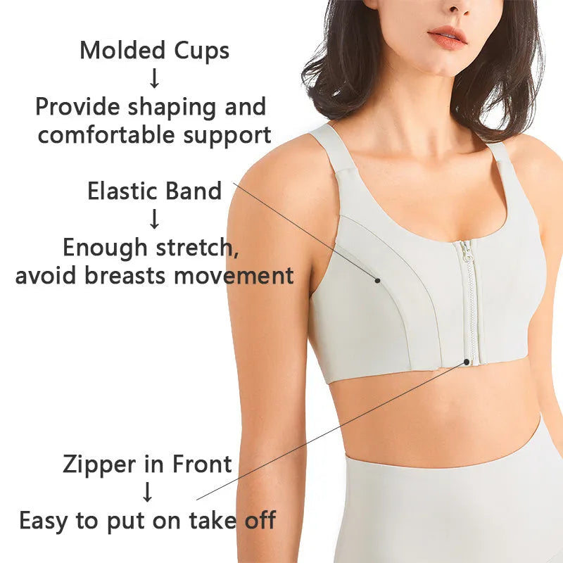 Zip front sports bra in pink lychee colour showing racerback shape and mesh back panel