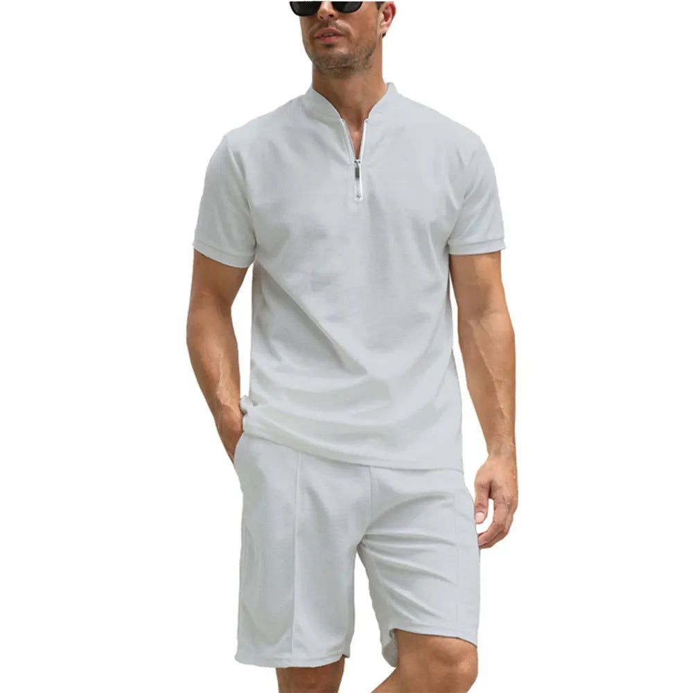 Men's solid colour beaded bird's eye polyester polo shirt suit two-piece set on a hanger.