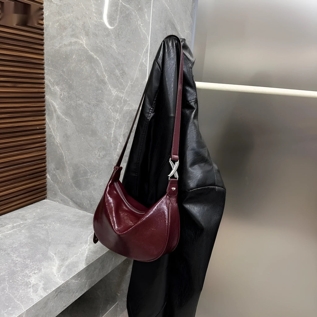 Women's cow leather crossbody bucket bag in Ankela Red with oil wax finish and shoulder straps