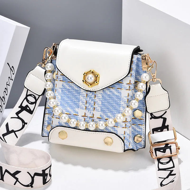 Women's crossbody phone bag in PU leather with pearl pendant and gold metal studs, magnetic flap closure