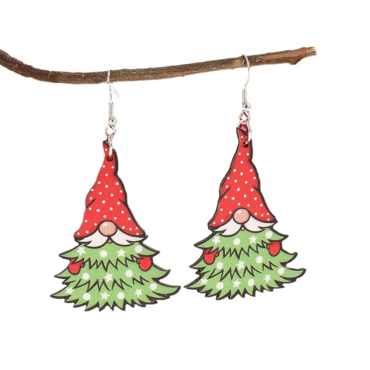 Wooden geometric Christmas earrings with printed festive designs on a white background.