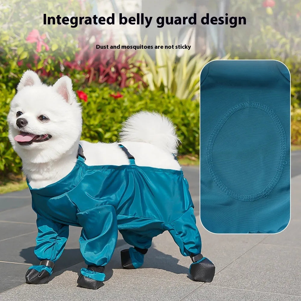 Peacock blue pet diaper bag belly jumpsuit made from waterproof memory cloth with foot-wrapped design on a small dog