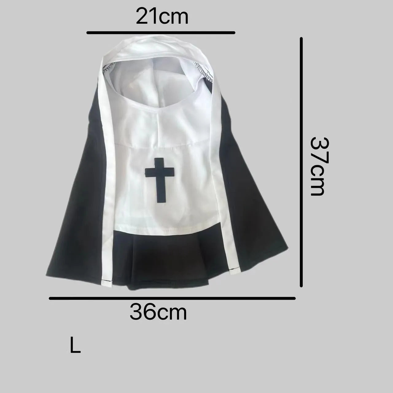 Black and white nun cloak costume on a small dog