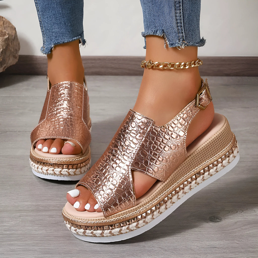 Gold women's Roman shoes with round toe, hollow-out design, and adjustable ankle buckle