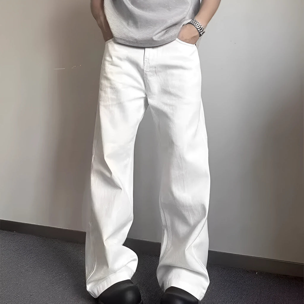 Men's white loose straight-leg wide-leg denim jeans on a mid-waist with a zipper fly.