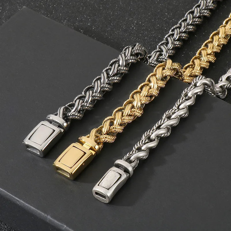 Men's keel twist titanium steel chain necklace in antique silver on a grey background