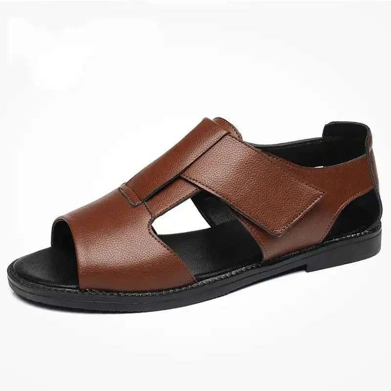 Men's black and brown leather open-toe sandals with a rubber sole on a neutral background.