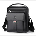 Men's PU leather crossbody shoulder bag in black plain finish with visible sewing line detail and crossbody strap
