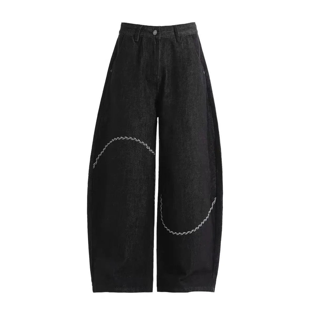 Black men's straight-leg denim trousers with a mid-rise waist and zip fly.