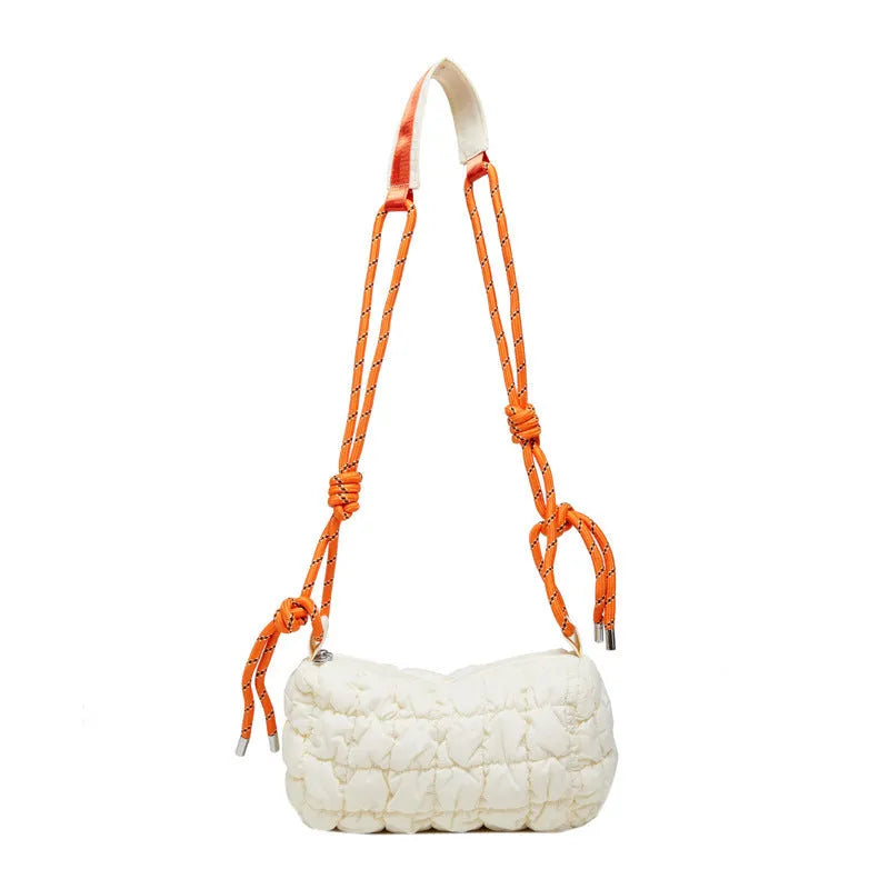 Soft pillow-shaped women's nylon messenger bag in choice of colours on adjustable crossbody strap.
