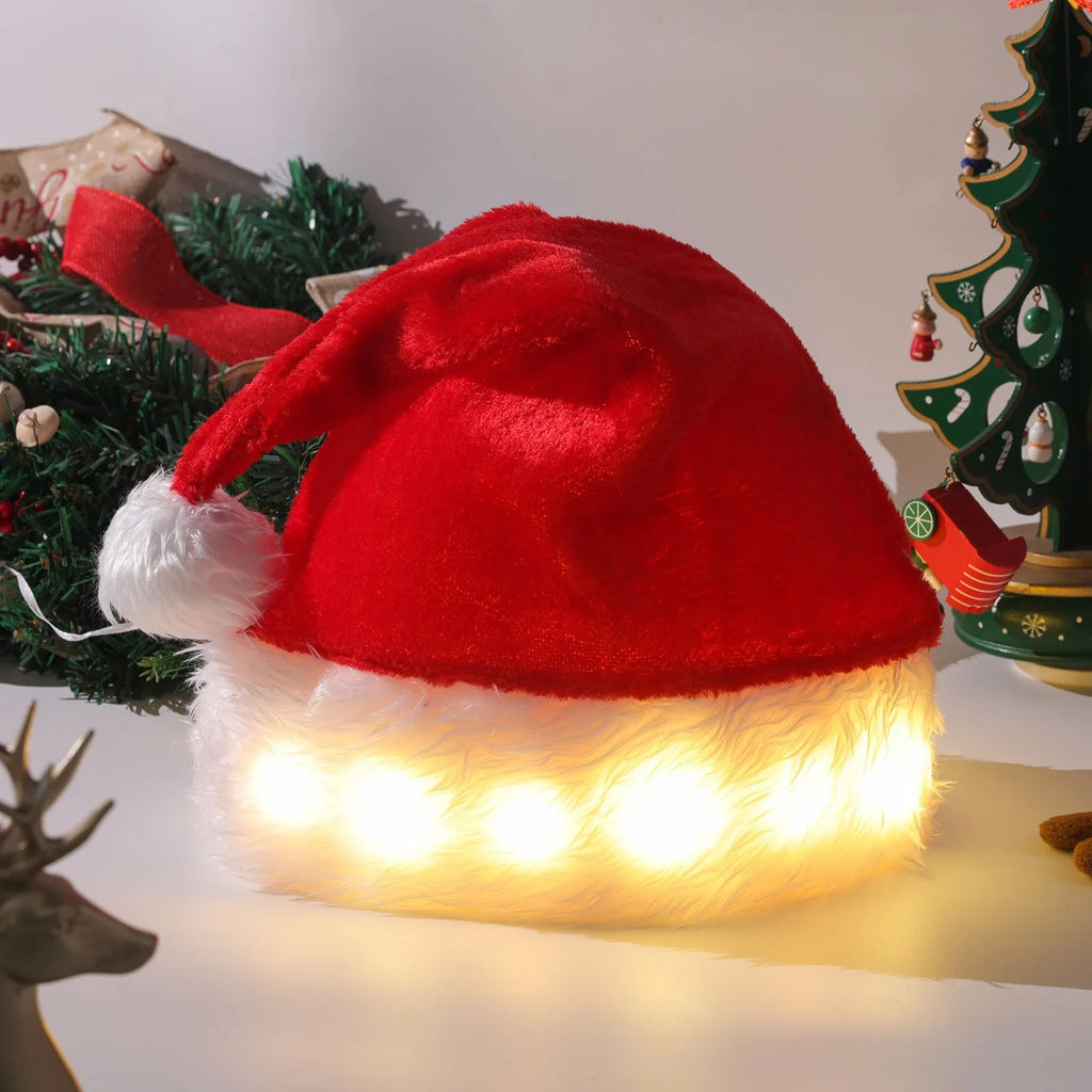 Red and white plush Santa hat with LED twinkling lights around brim and pom-pom