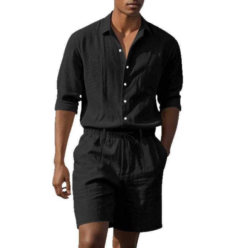 Men's linen beach suit consisting of a long sleeve shirt and shorts, shown in light blue colour.