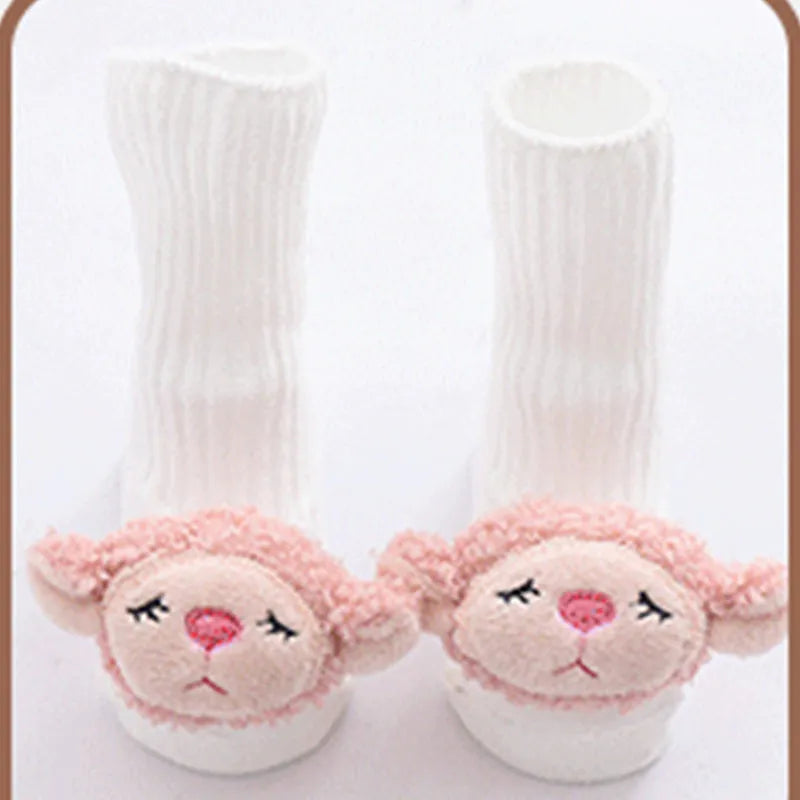 Cotton baby floor socks in assorted colours and prints like blue bow and pink stars on a size chart.