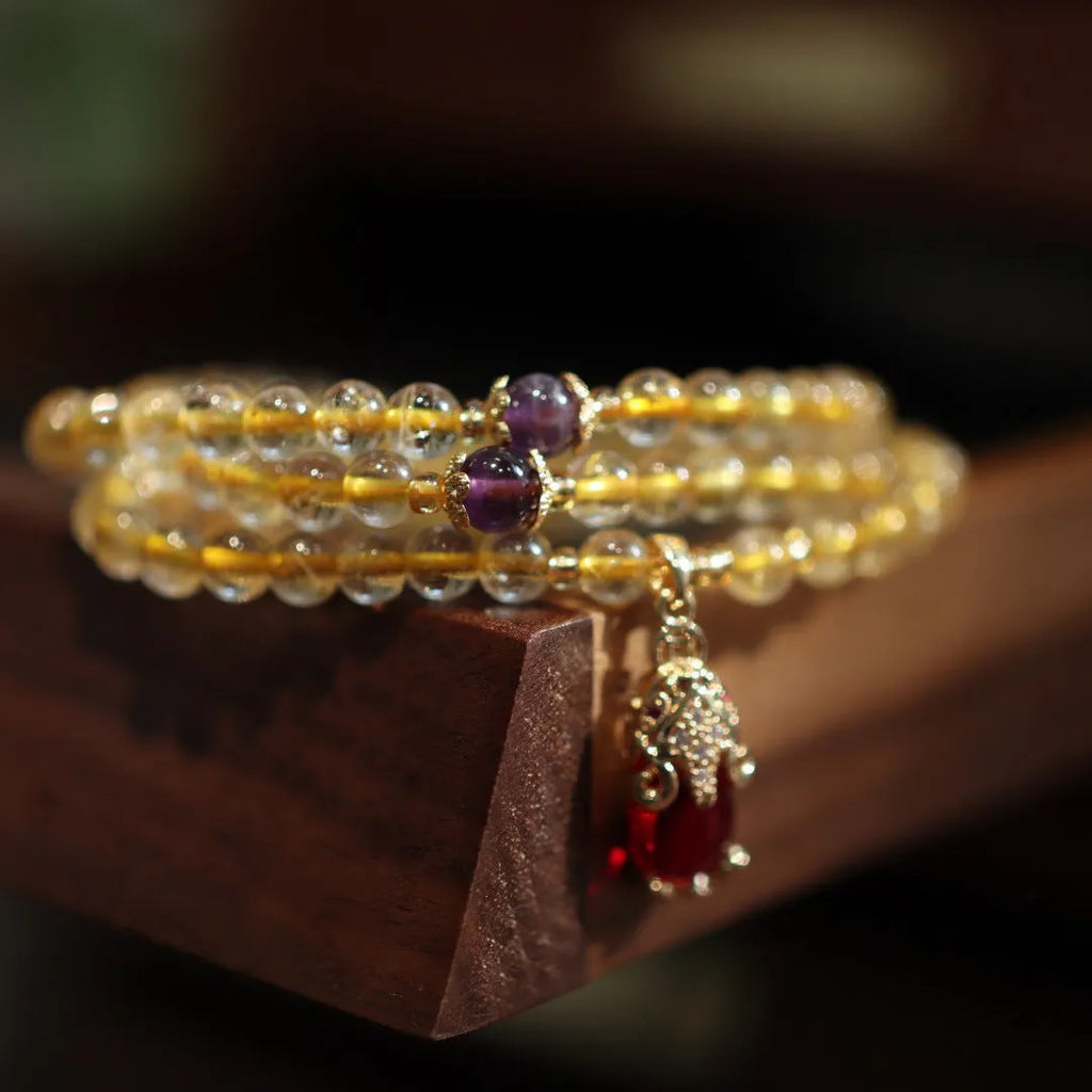 Natural Brazilian gold rutilated quartz bracelet with three-circle Chinese design and hanging chopsticks decoration