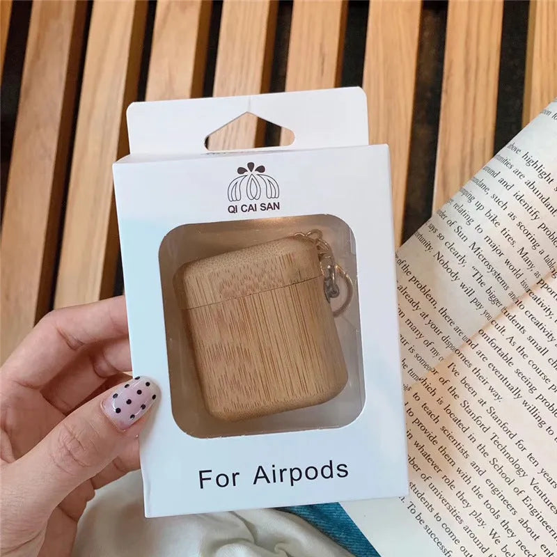 Wood grain clamshell earphone cover for AirPods 1 or 2 in carbonized wood colour, made from wood or bamboo.