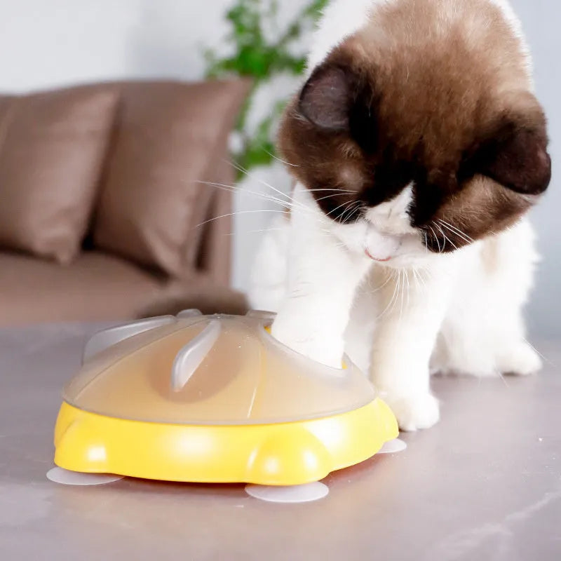 Yellow educational cat puzzle feeder bowl with adjustable difficulty compartments for treat storage