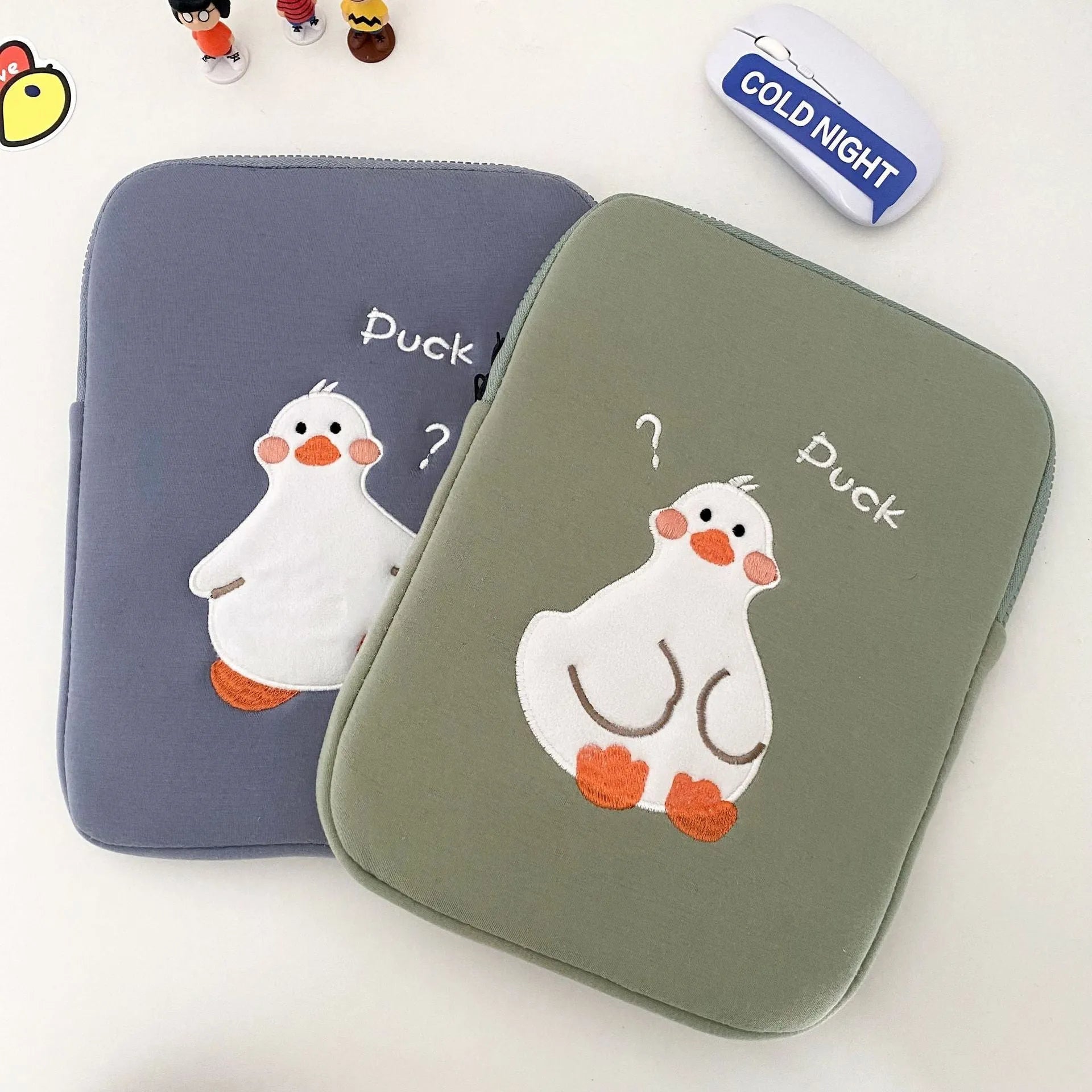 Blue cotton tablet case with duck embroidery, zipper closure, and 11inch to 15to16inch size options