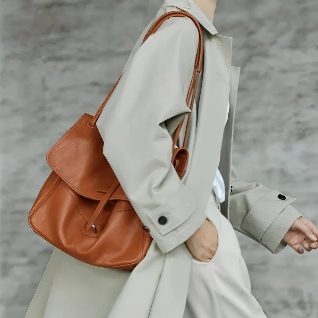 Vegetable-tanned leather retro crossbody tote bag in coffee, elephant gray, caramel or black, large or medium, with inner patch pocket.