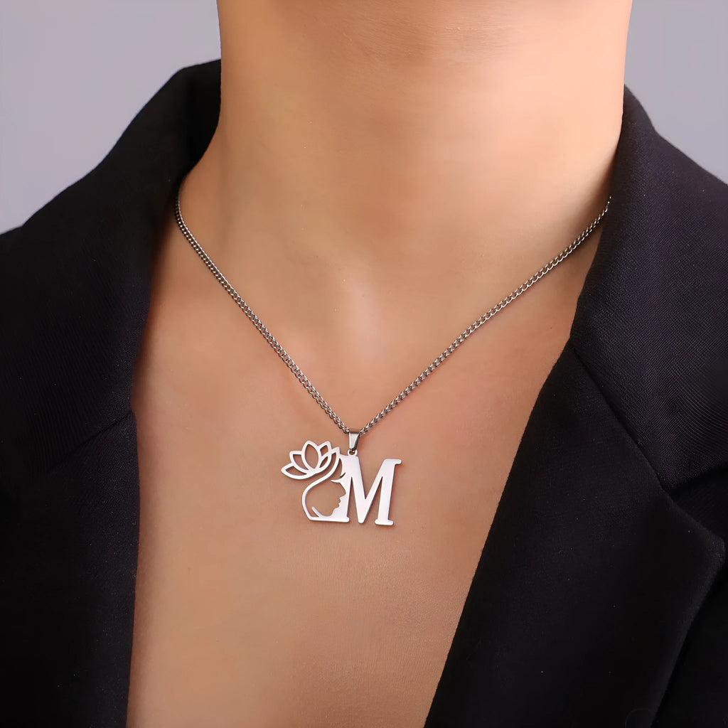 Stainless steel cross chain necklace with pendant in gold or silver electroplated finish.