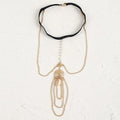 Women's white pearl multi-layer geometric body chain anklet on a light background