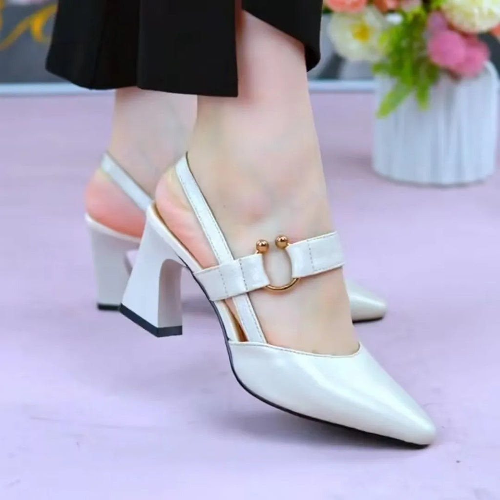 Women's apricot leather sandals with a closed toe, chunky heel, and an oversleeve fastening on the back.