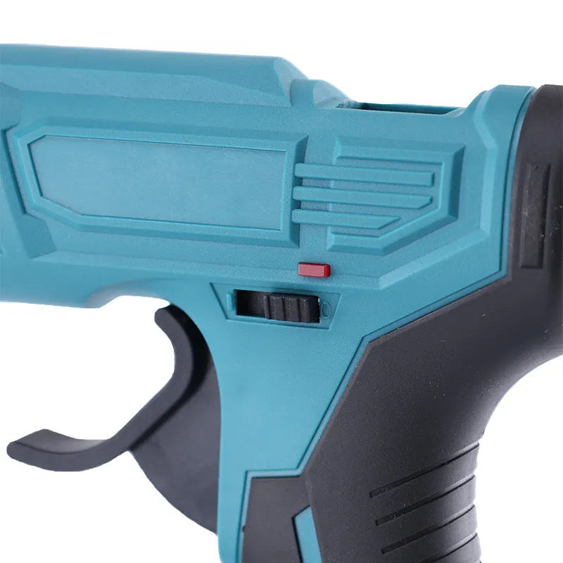 Handheld bare metal rechargeable hot melt glue gun with battery, charger, and glue sticks.
