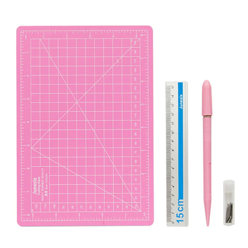 Art pen knife cutting board set with backing board, ruler, sharpener, and blade in choice of colours