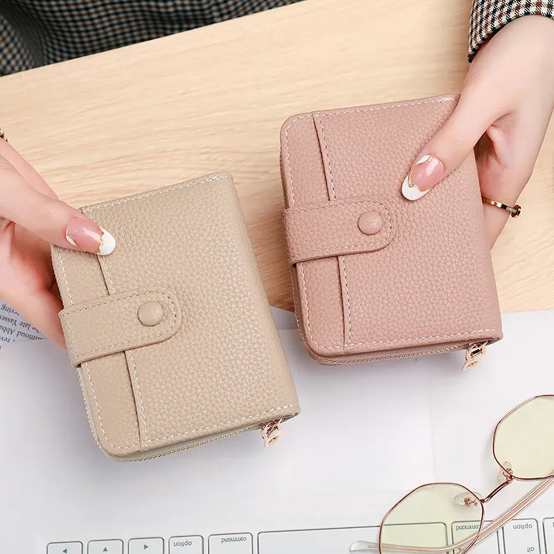 Ladies short wallet with lychee pattern in two-fold design showing beige colour option