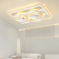 Modern thin suction ceiling fan lamp with plastic blades and acrylic lampshade mounted on a white ceiling.