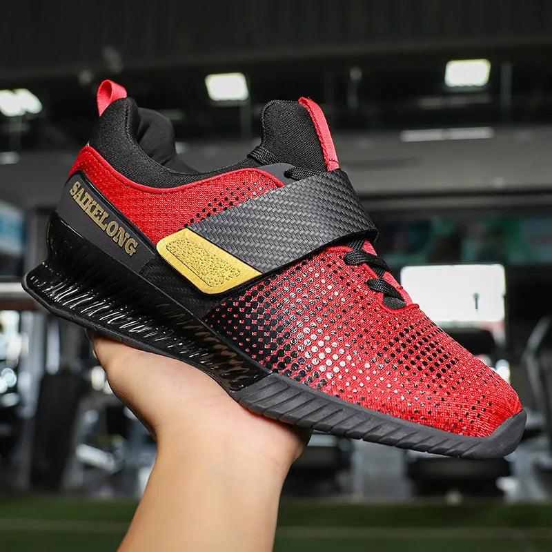 Pair of unisex weightlifting shoes with breathable Oxford cloth upper and non-slip rubber TPU sole, in red or dark blue.