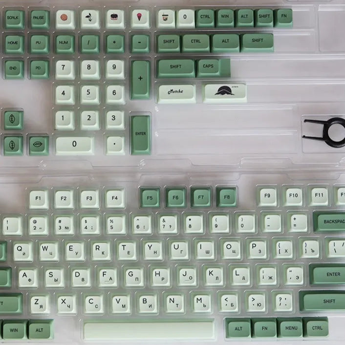 124 PBT dye-sublimation keycap set in matcha green colour on a keyboard.