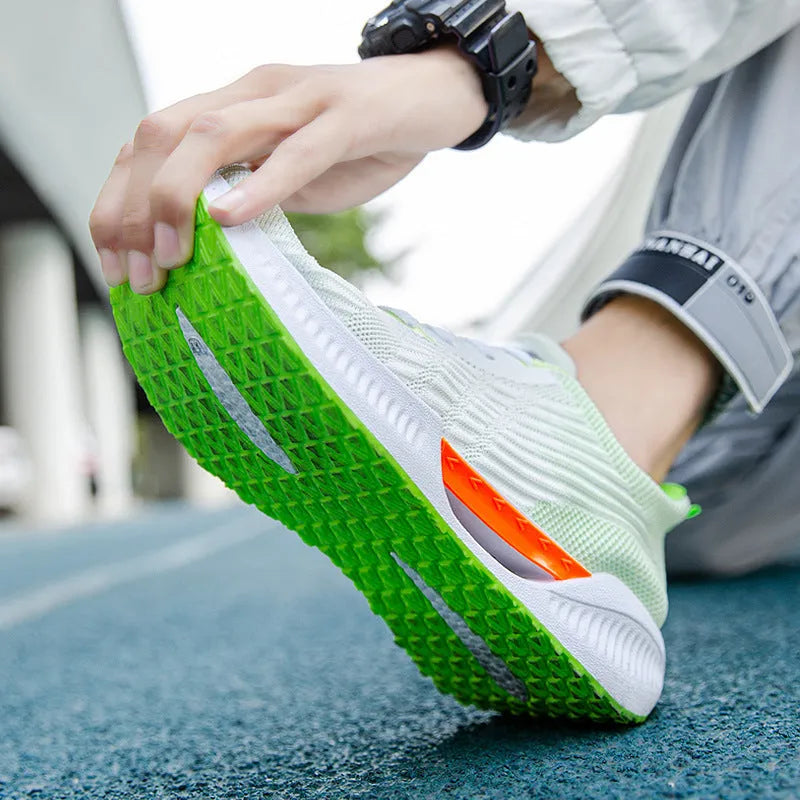 Men's blue casual mesh sports shoes with round toe and cloth upper.