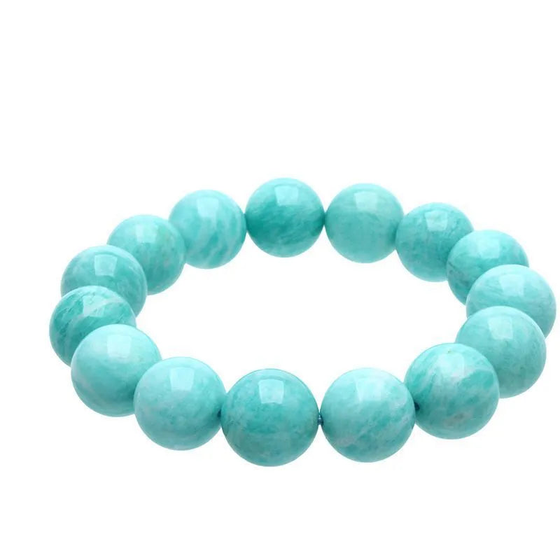 Natural blue-green Amazonite gemstone bracelet with adjustable closure on a wrist.