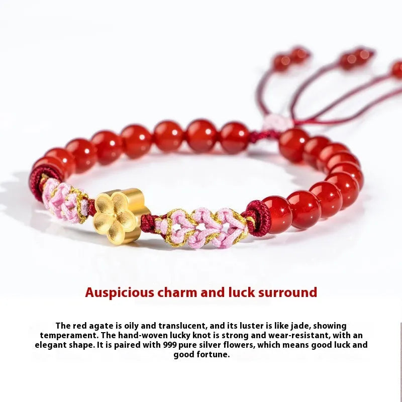 Crystal bracelet with hand-woven red rope strap and peach blossom design in diamond shape