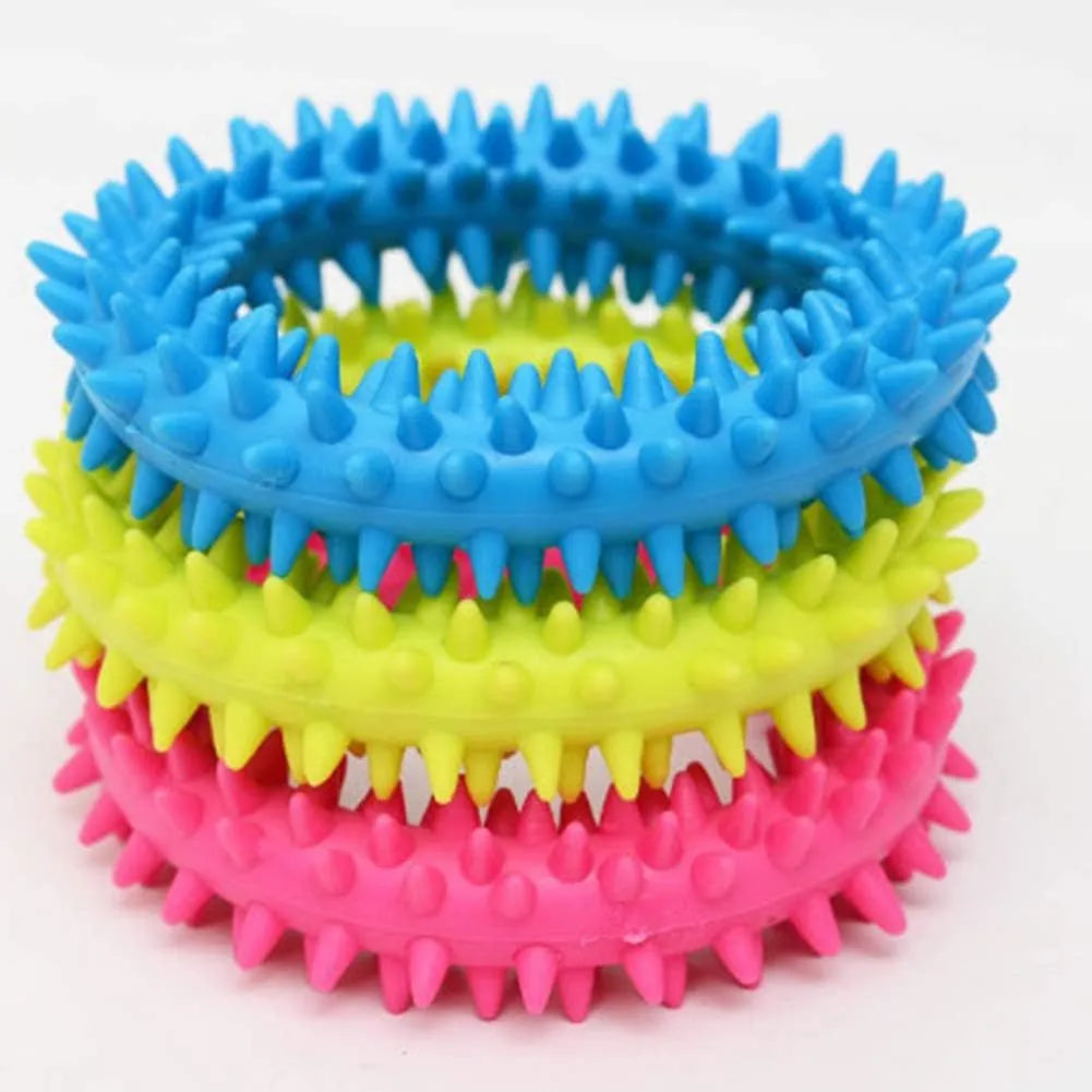 Blue TPR spiky ring dog chew toy for dental care and bite training, 9.5cm diameter.