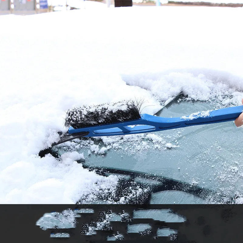 Blue hard plastic car snow shovel with nylon brush, 52 cm, on a windscreen with snow