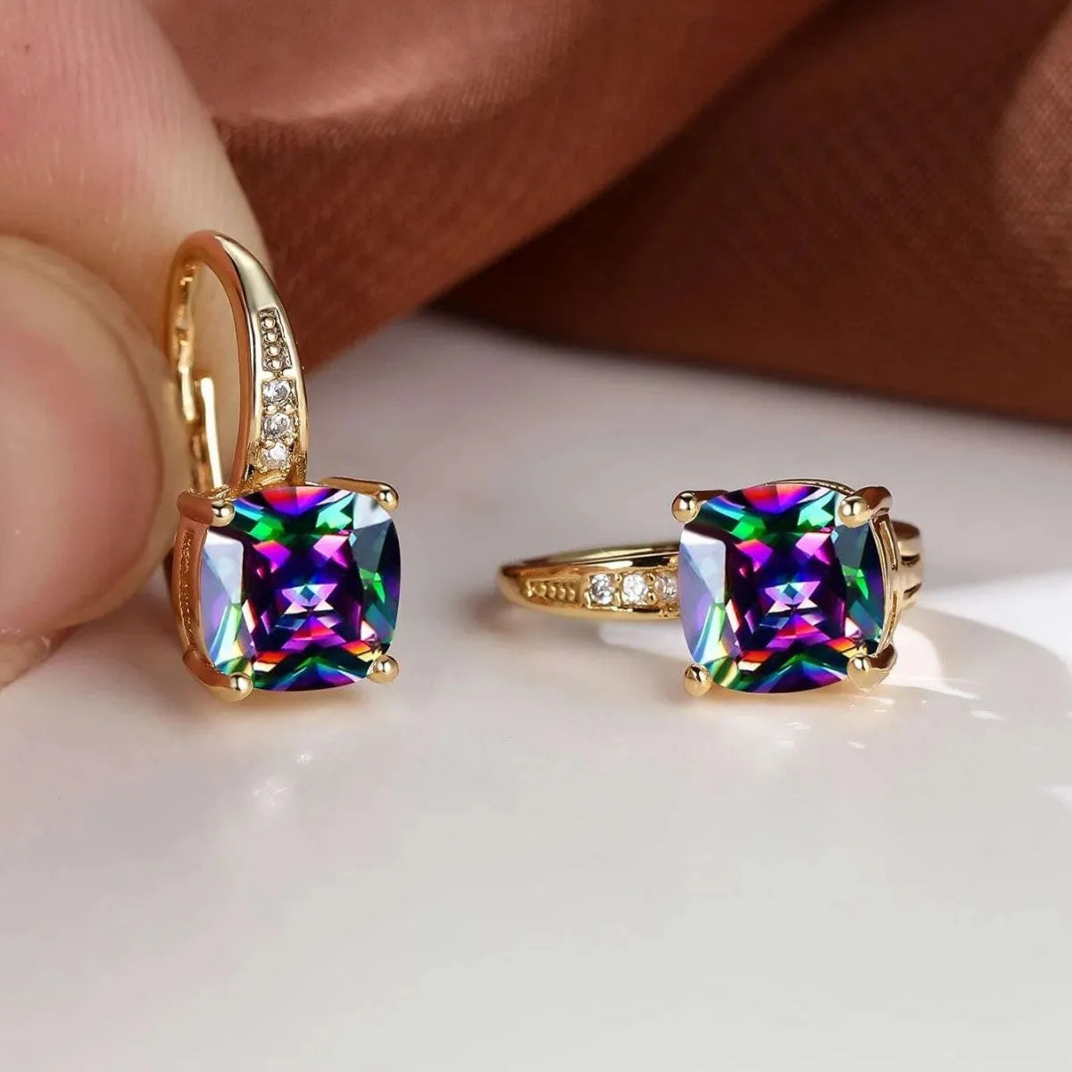 Geometric ear clips with square colourful moissanite inlays and electroplated gold finish