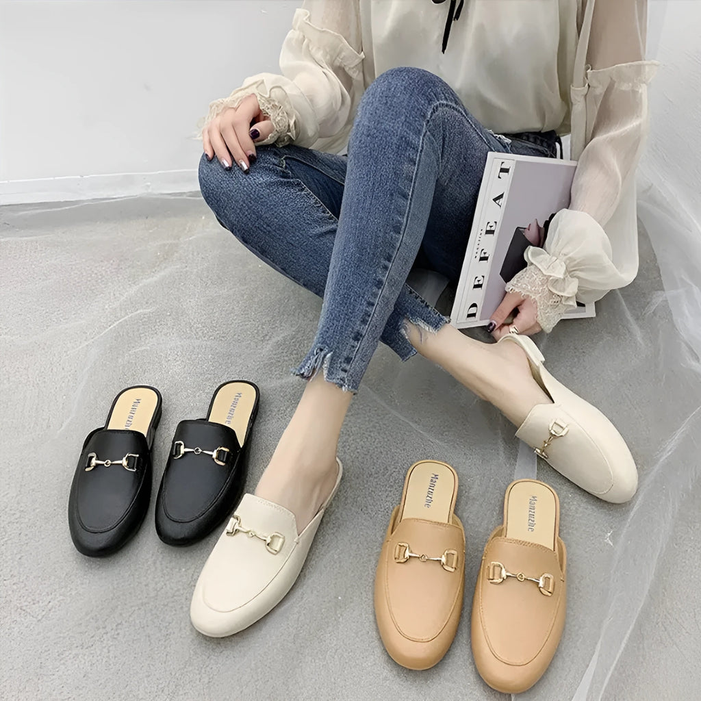 Women's PVC closed toe half slippers with buckle fastening in white, black and brown colours