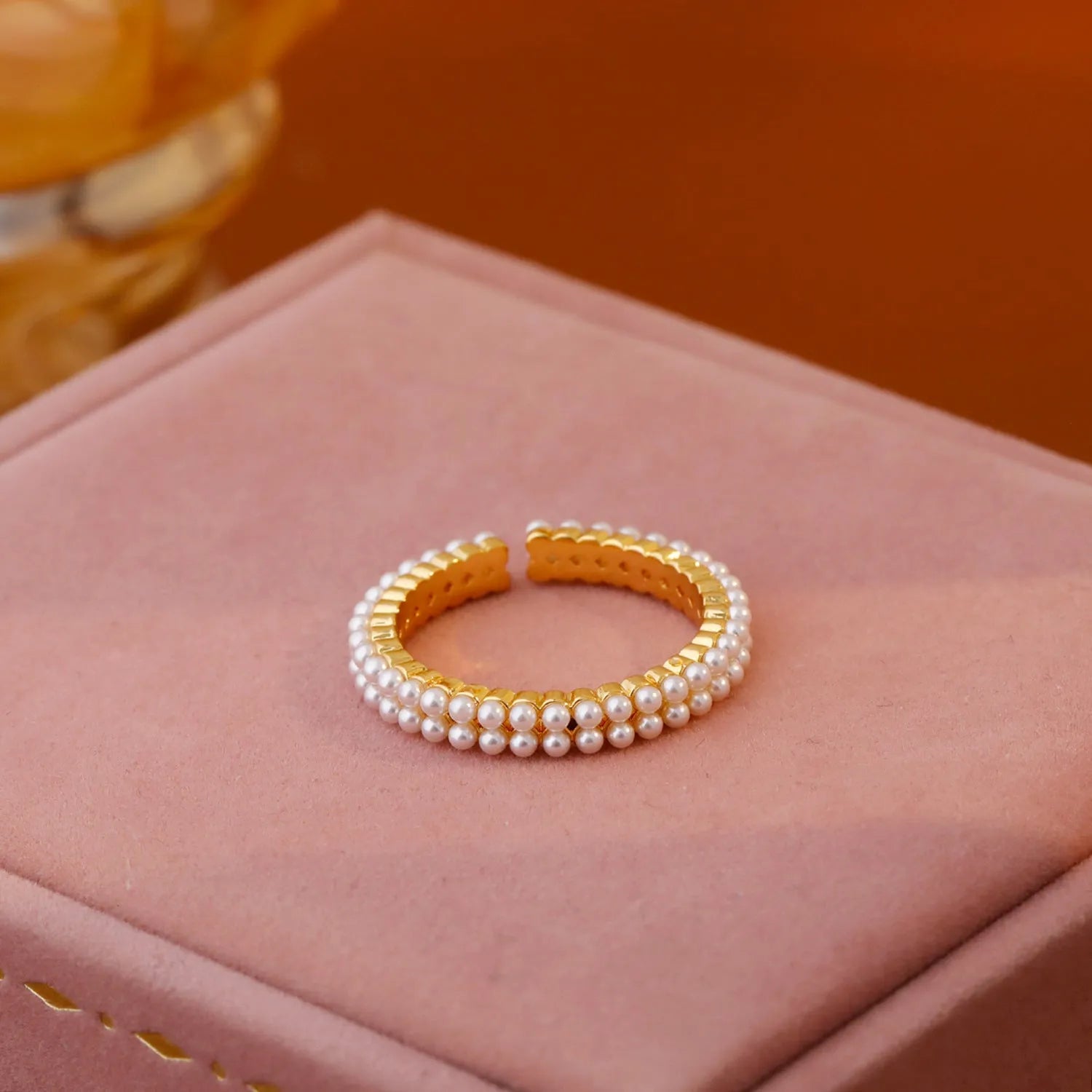 Gold geometric open mouth women's ring with round elements and electroplated copper construction